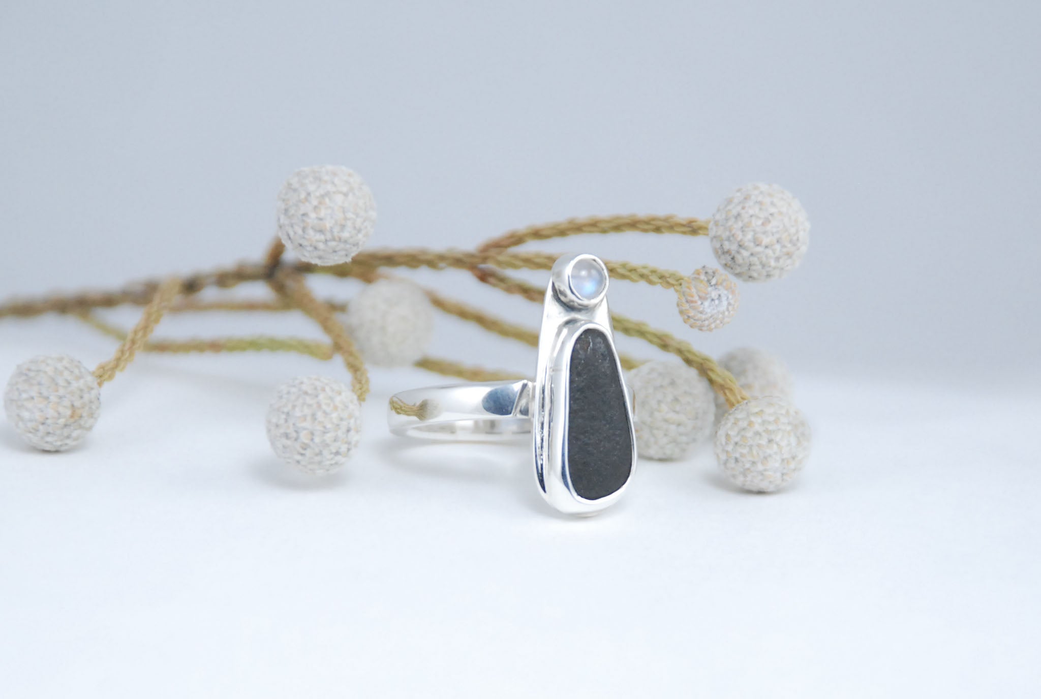 Black stone and moonstone Sterling silver ring.