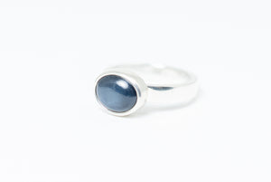 Silver ring with blue star sapphire