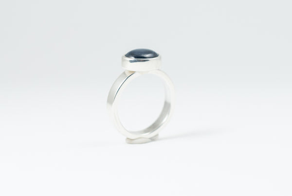 Silver ring with blue star sapphire