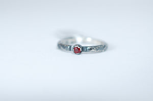 Oxidized silver stacking ring with Ruby. Designer jewellery.