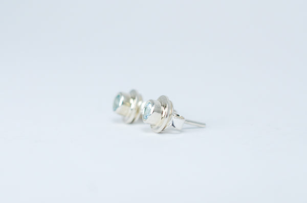 Designer jewellery. Silver stud earrings with Aquamarine gemstone.