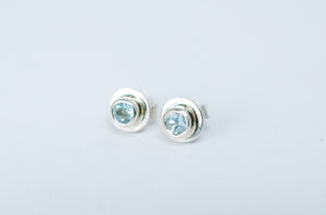 Designer jewellery. Silver stud earrings with Aquamarine gemstone.