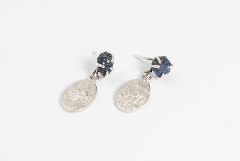 Silver earrings with raw blue sapphire
