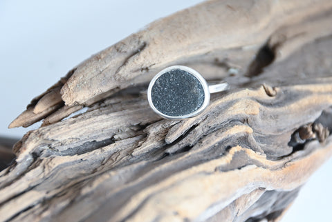 Shimmering seaside stone ring.
