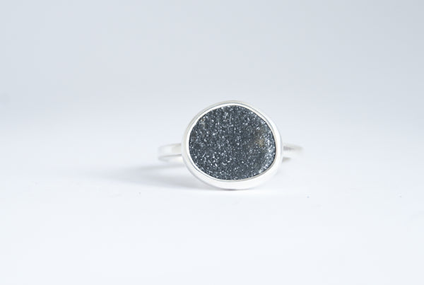 Shimmering seaside stone ring.