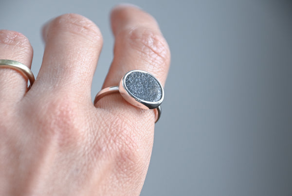Shimmering seaside stone ring.