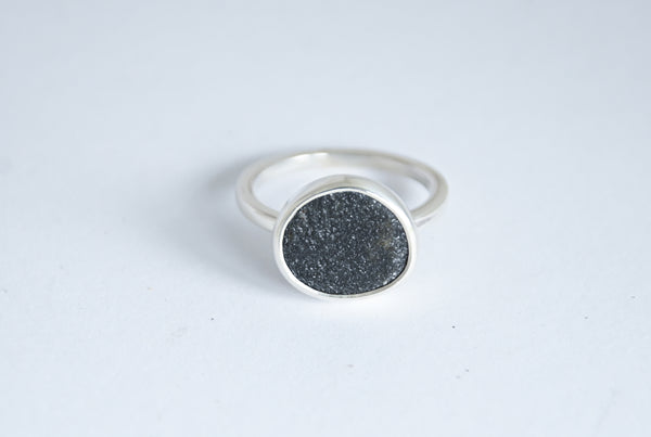 Shimmering seaside stone ring.