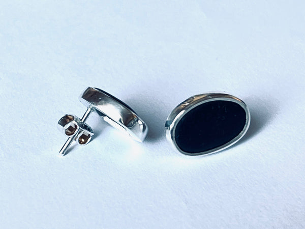 Silver stud earrings with raw Black stone