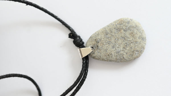 Necklace with a natural grey stone pendant. Summer vibes.
