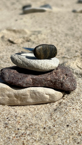 Handmade silver jewellery with black seashore pebble