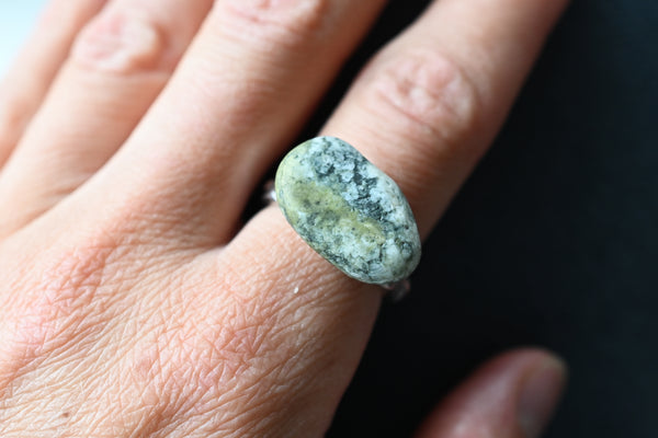 Handmade silver ring with green seashore pebble. Silver jewellery.