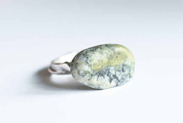 Handmade silver ring with green seashore pebble. Silver jewellery.