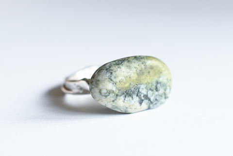 Handmade silver ring with green seashore pebble. Silver jewellery.