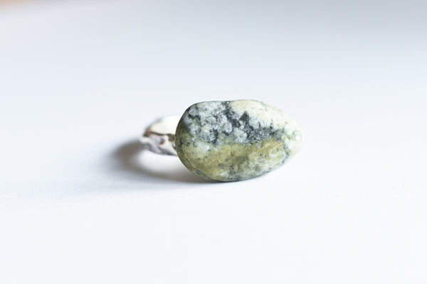 Handmade silver ring with green-grey pebble