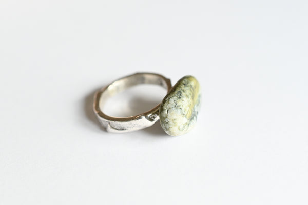 Handmade silver ring with green-grey pebble
