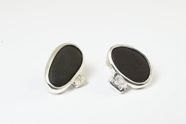 Handmade silver earrings with beach pebbles. Designer jewellery