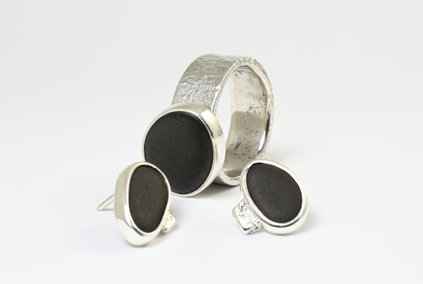 Handmade silver earrings with beach pebbles. Designer jewellery