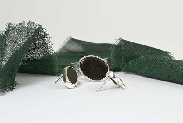 Rough wide handmade silver ring with beach pebble