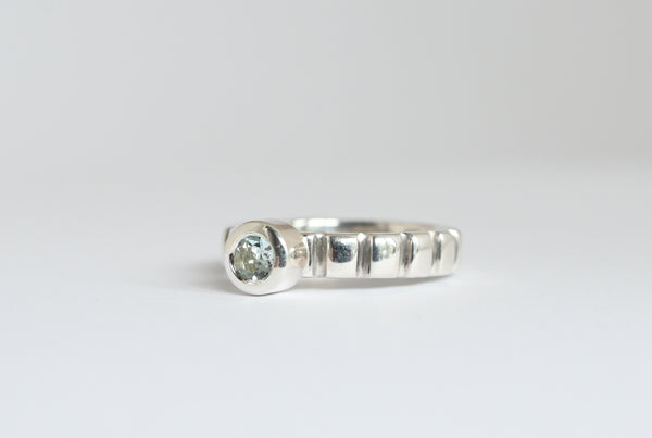 Vertical line silver band ring with aquamarine