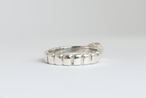 Vertical line silver band ring with aquamarine