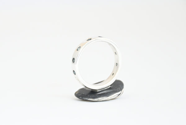 Handmade Silver ring with wavy design and sapphires