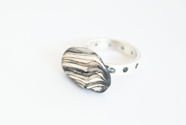 Handmade Silver ring with wavy design and sapphires