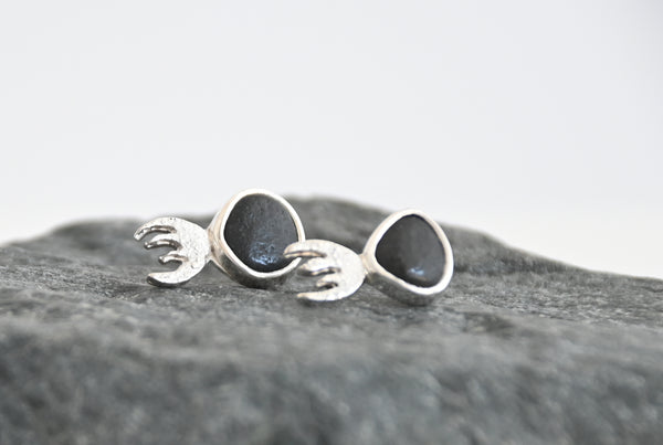 Pair of jellyfish silver earrings with black seashore stones 