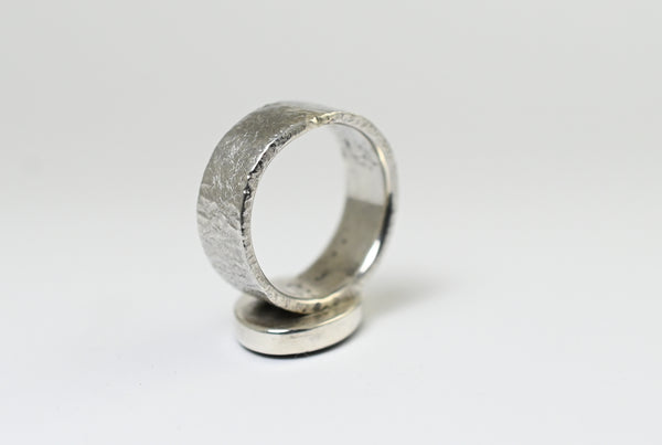 Rough wide handmade silver ring with beach pebble