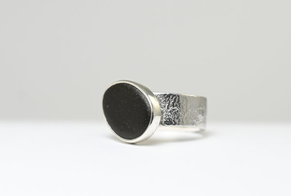 Rough wide handmade silver ring with beach pebble
