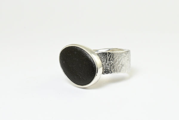 Rough wide handmade silver ring with beach pebble