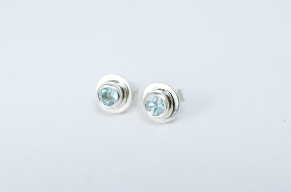 Designer jewellery. Silver stud earrings with Aquamarine gemstone.