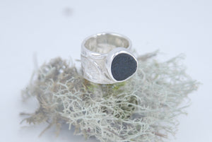 Small size wide band silver ring with raw black stone