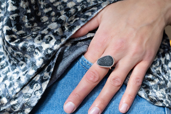 Shimmering black seaside stone ring.