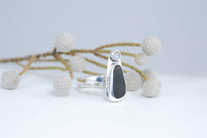 Black stone and moonstone Sterling silver ring.