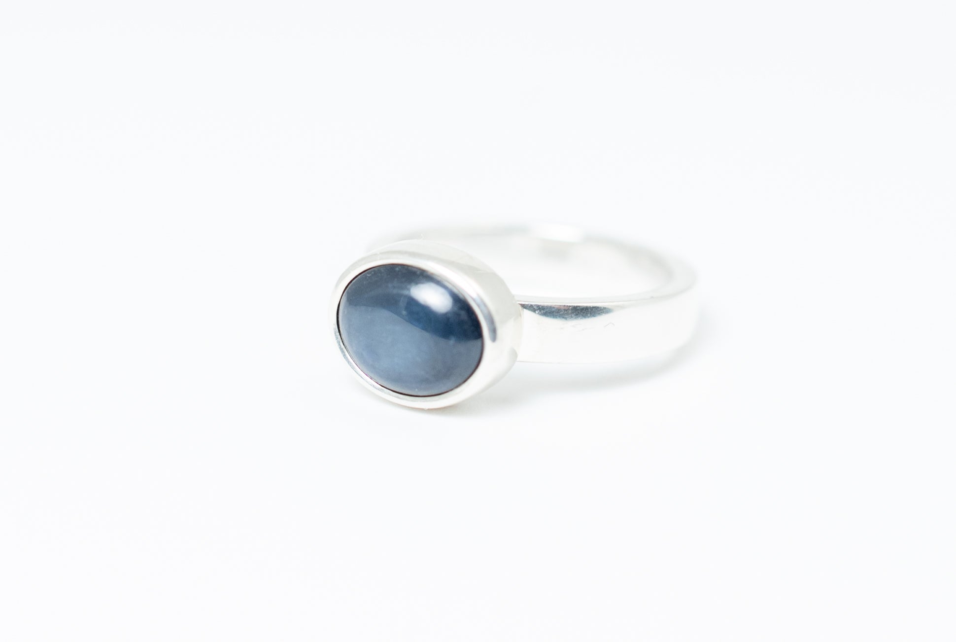 Silver ring with blue star sapphire