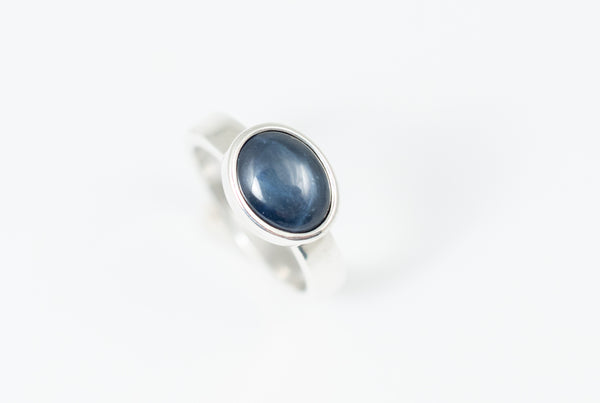 Silver ring with blue star sapphire