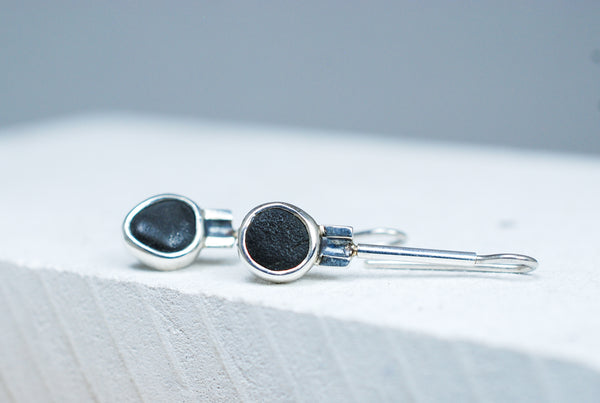 Dangling silver earrings with natural Black stone