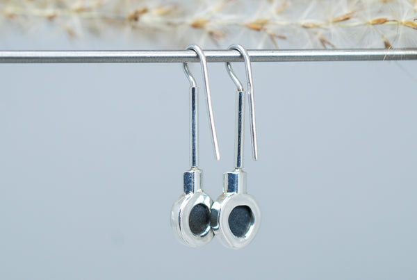 Dangling silver earrings with natural Black stone