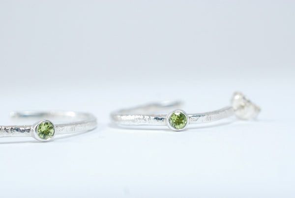 Silver hoops earrings with green peridot stone