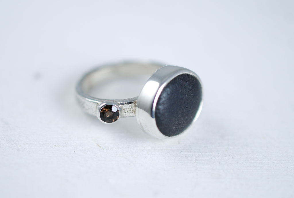 Zancan silver ring with black stone.