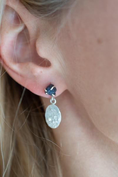 Silver earrings with raw blue sapphire