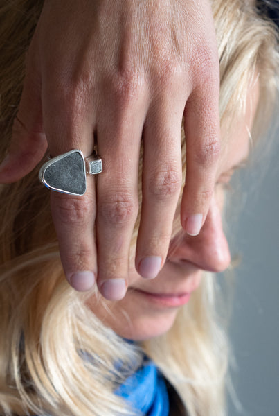 Rough grey diamond and seaside stone