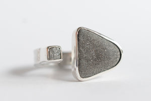 Rough grey diamond and seaside stone